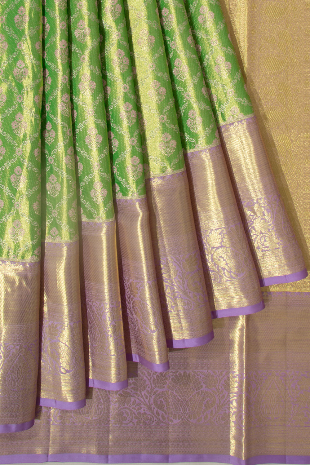 Taranga Kanchi Silk Tissue Jaal And Butta Green Saree