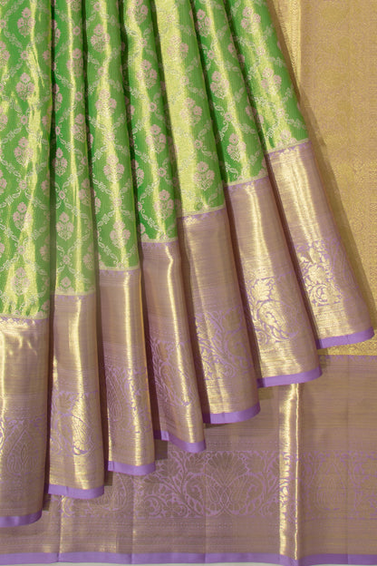 Taranga Kanchi Silk Tissue Jaal And Butta Green Saree