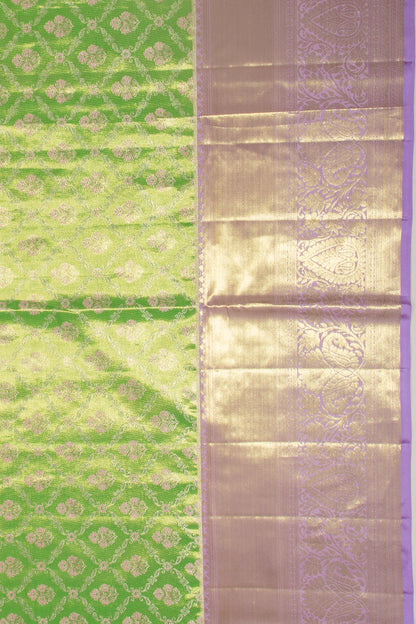Taranga Kanchi Silk Tissue Jaal And Butta Green Saree