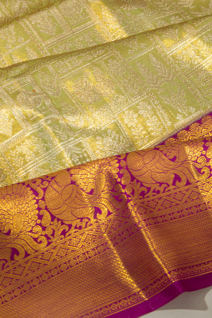 Taranga Kanchi Silk Tissue Brocade Green Saree