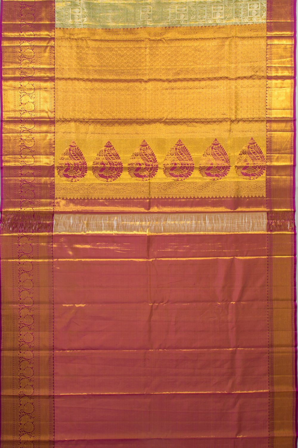 Taranga Kanchi Silk Tissue Brocade Green Saree