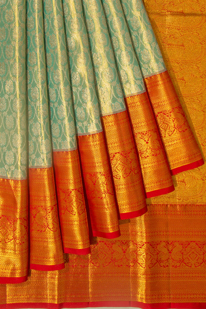 Taranga Kanchi Silk Tissue Brocade Green Saree