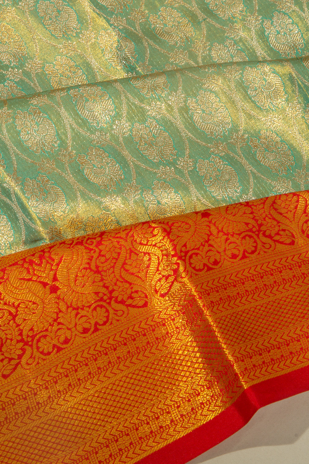 Taranga Kanchi Silk Tissue Brocade Green Saree