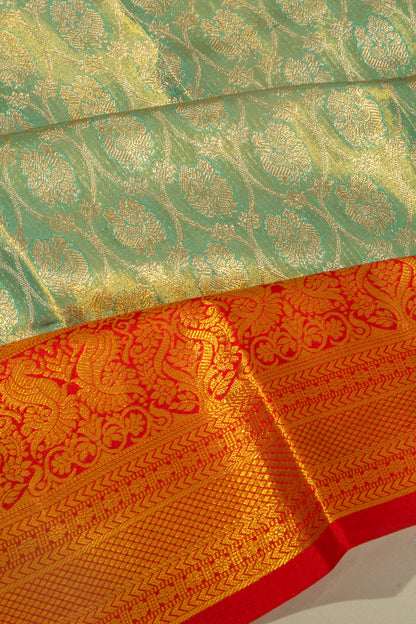 Taranga Kanchi Silk Tissue Brocade Green Saree