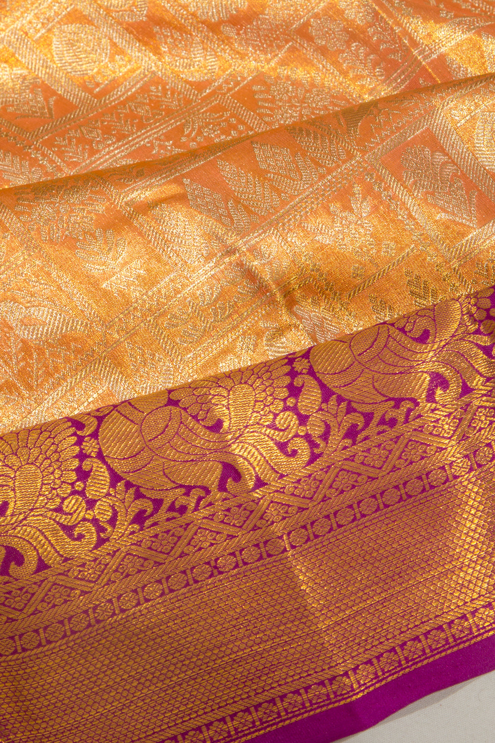 Taranga Kanchi Silk Tissue Brocade Orange Saree