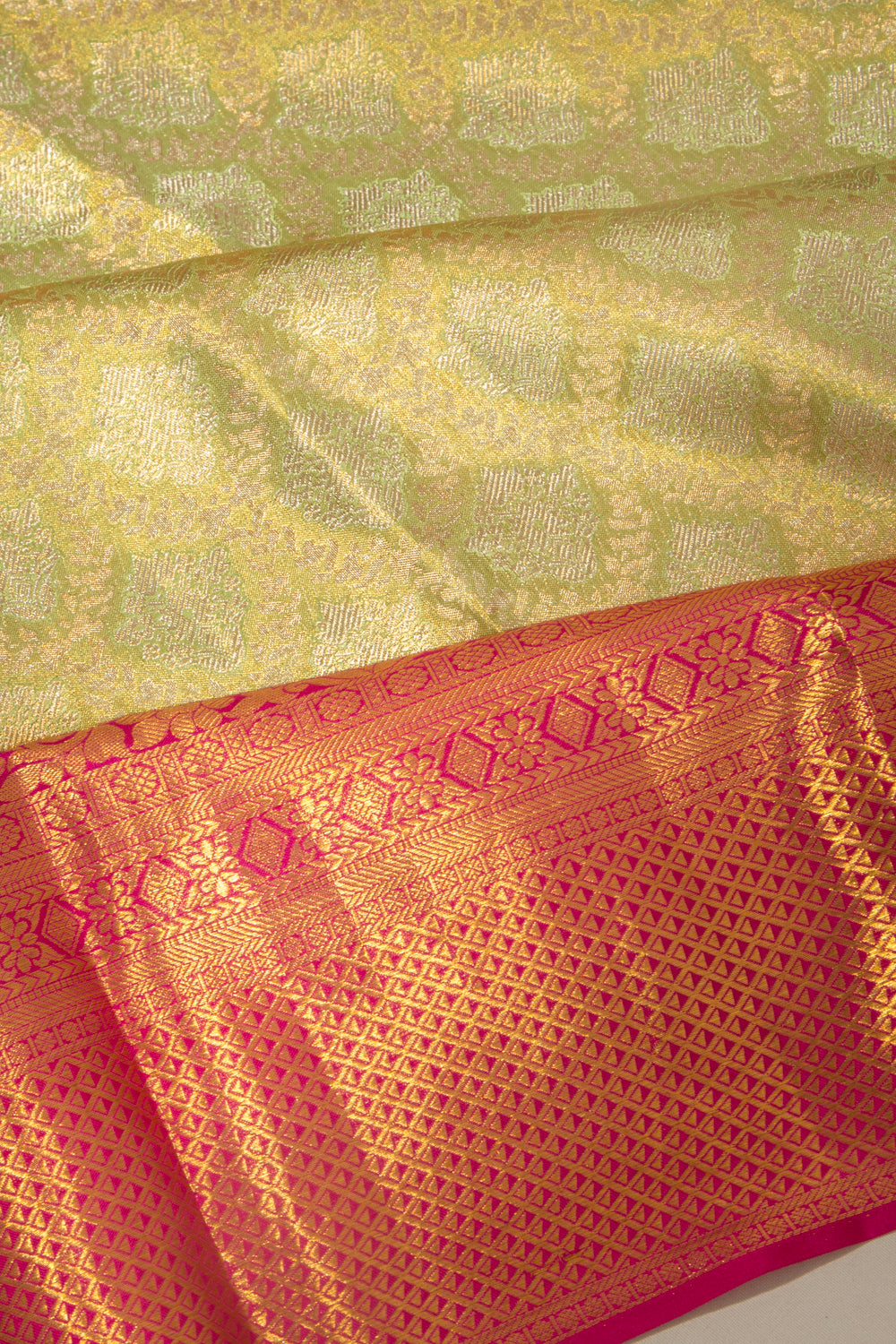 Taranga Kanchi Silk Tissue Brocade Green Saree