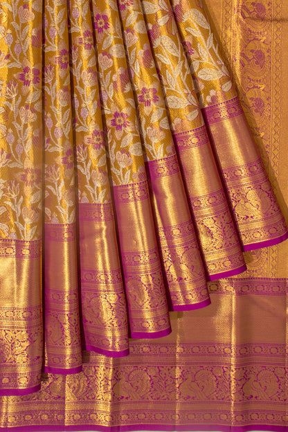 Taranga Kanchi Silk Tissue Jaal Gold Saree