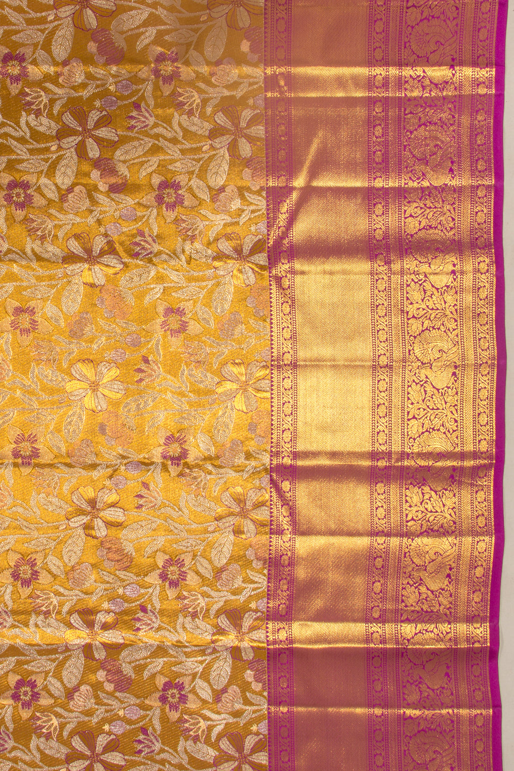 Taranga Kanchi Silk Tissue Jaal Gold Saree