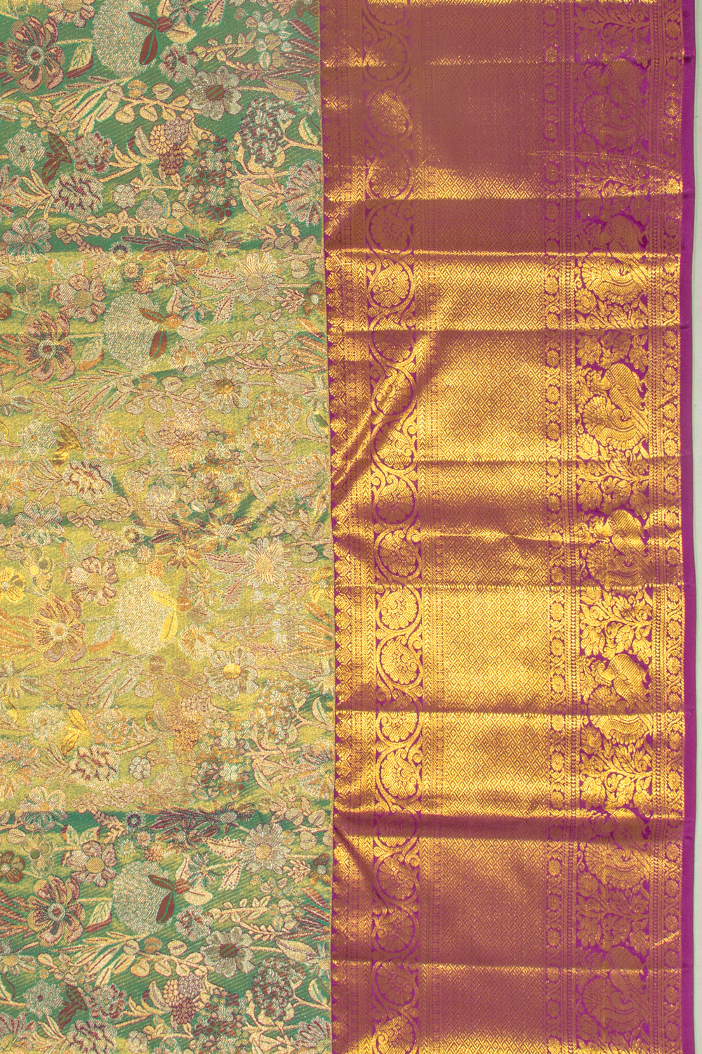 Taranga Kanchi Silk Tissue Brocade Green Saree