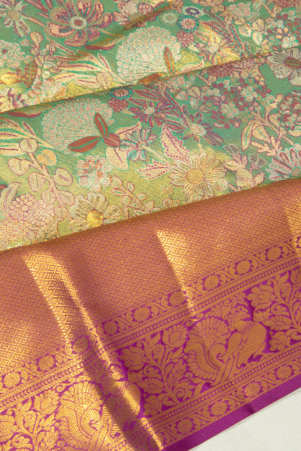 Taranga Kanchi Silk Tissue Brocade Green Saree
