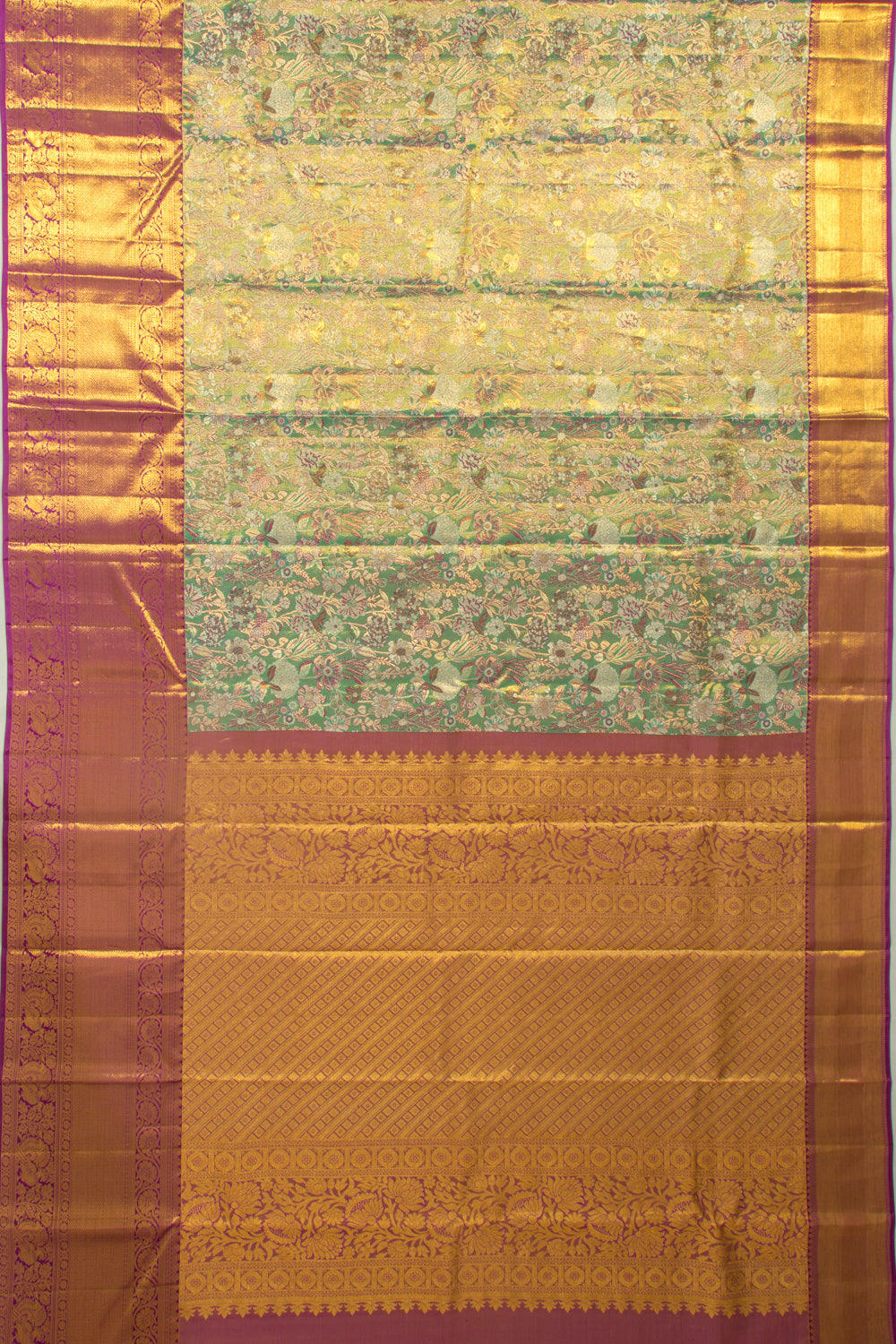 Taranga Kanchi Silk Tissue Brocade Green Saree