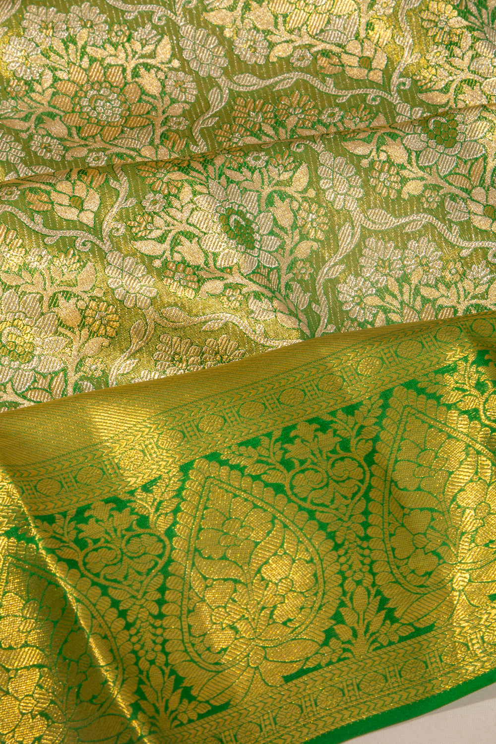 Taranga Kanchi Silk Tissue Brocade Green Saree