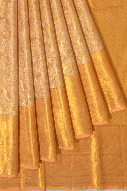 Taranga Kanchi Silk Tissue Brocade Pastel Orange Saree