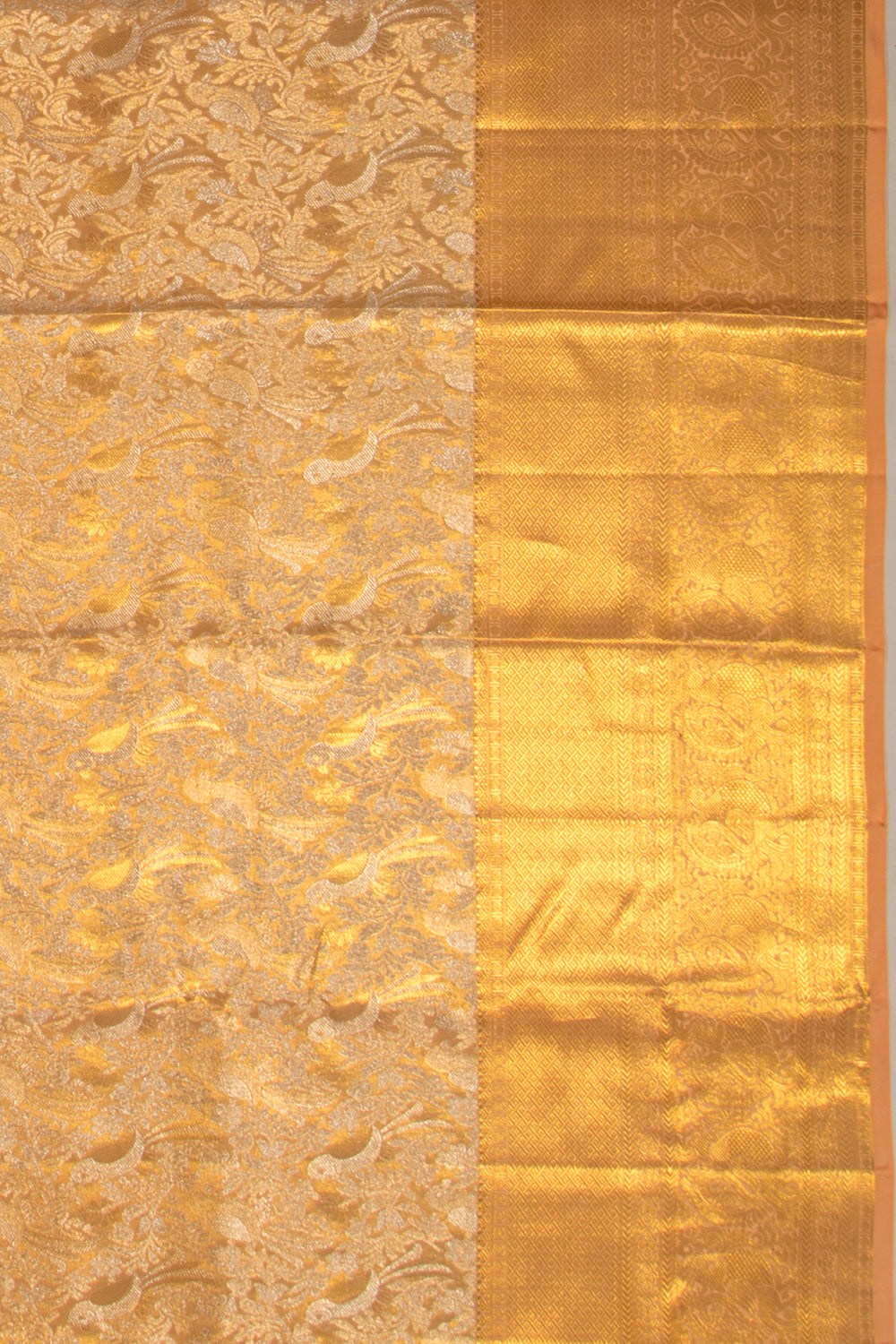Taranga Kanchi Silk Tissue Brocade Pastel Orange Saree