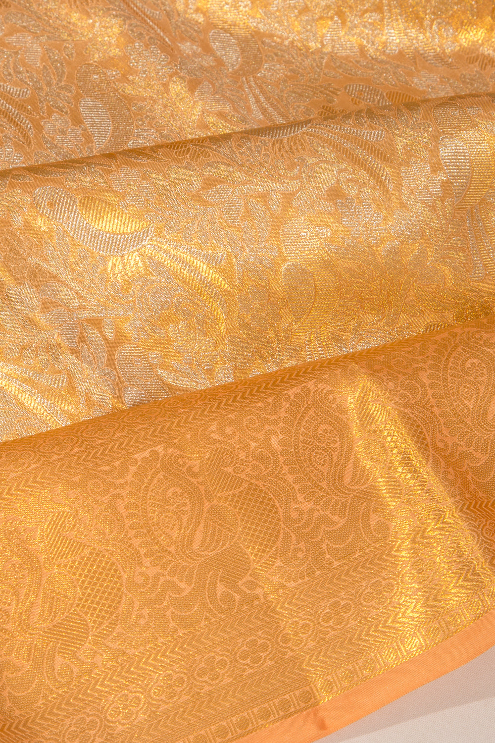 Taranga Kanchi Silk Tissue Brocade Pastel Orange Saree