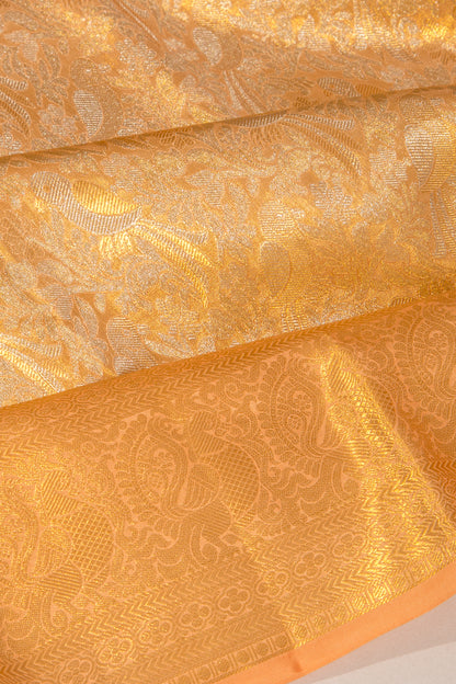 Taranga Kanchi Silk Tissue Brocade Pastel Orange Saree