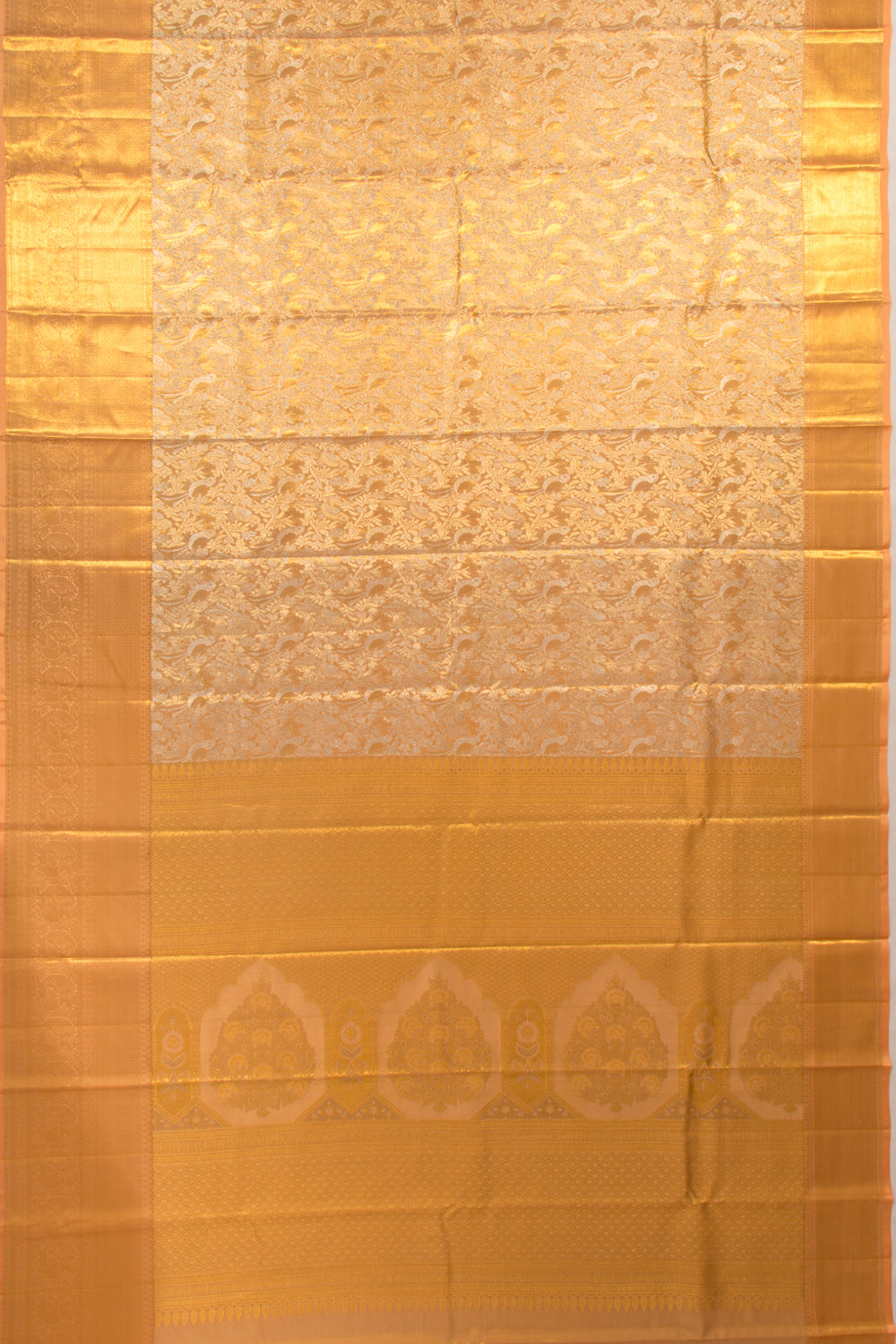 Taranga Kanchi Silk Tissue Brocade Pastel Orange Saree
