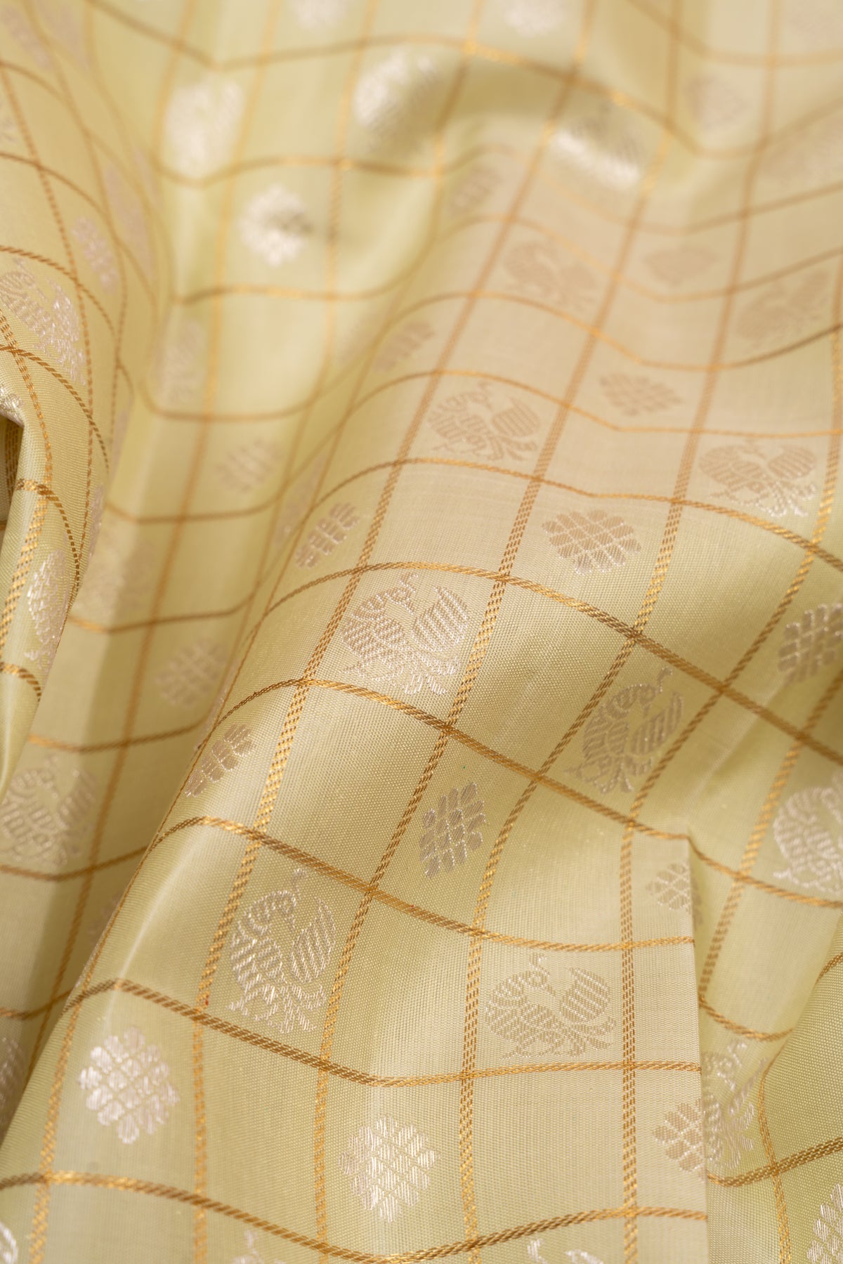 Kanchipuram Silk Checks And Butta Pista Green Saree