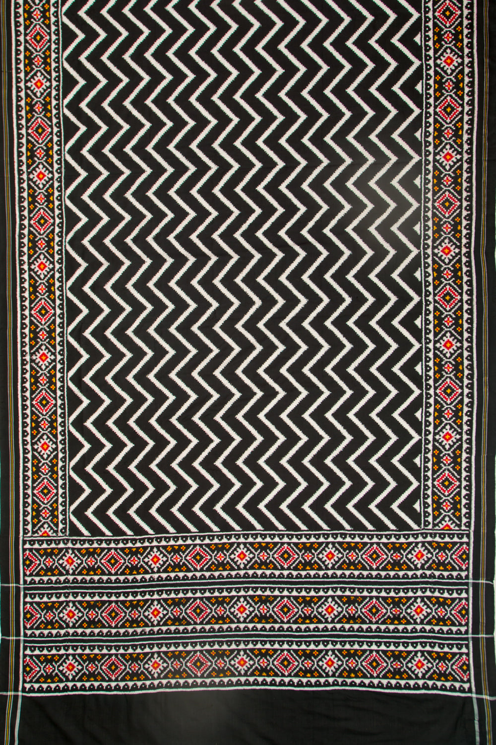 Patan Patola Silk Ikat White And Black Saree