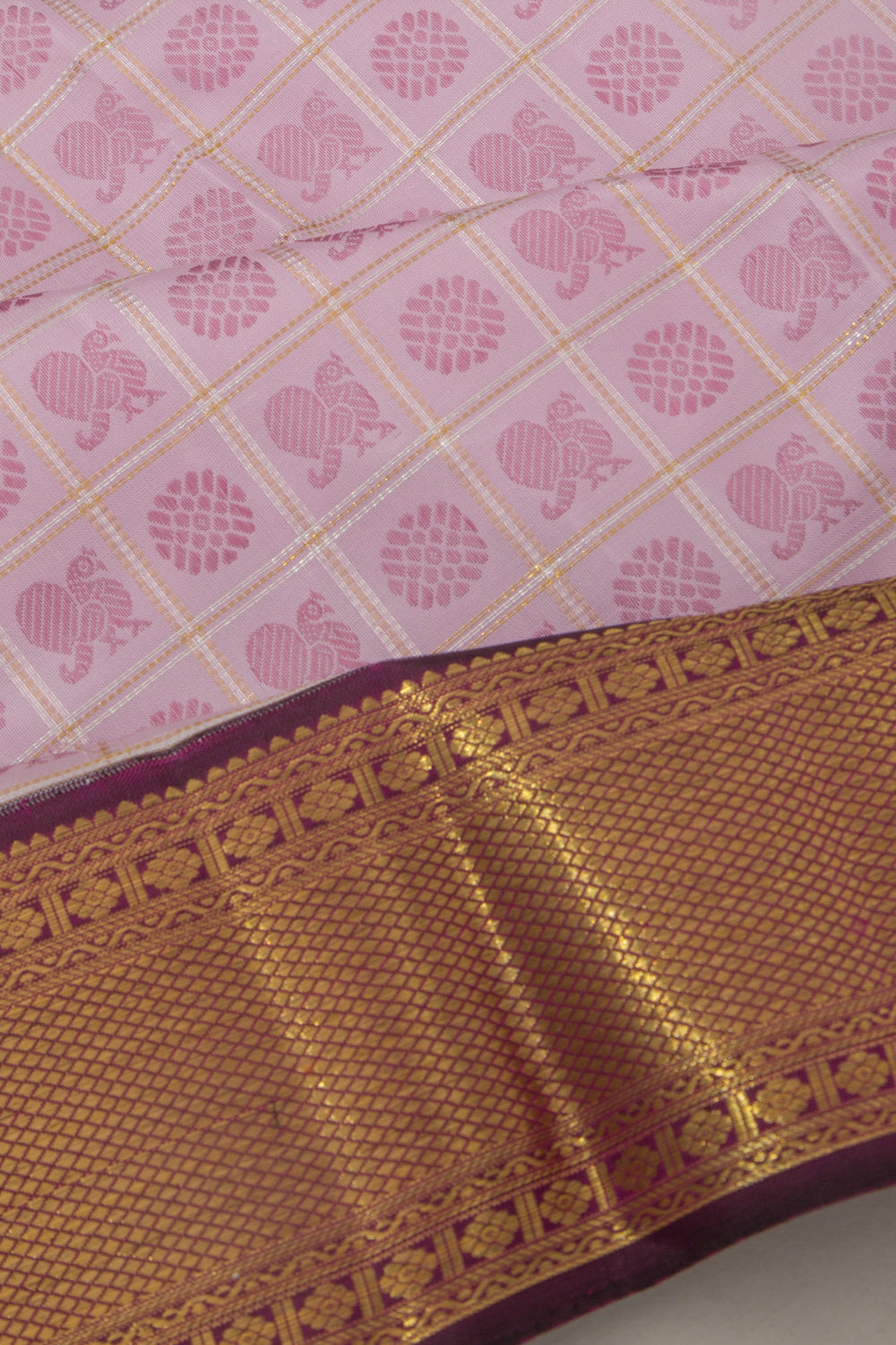 Kanchipuram Silk Checks And Butta Lavender Saree