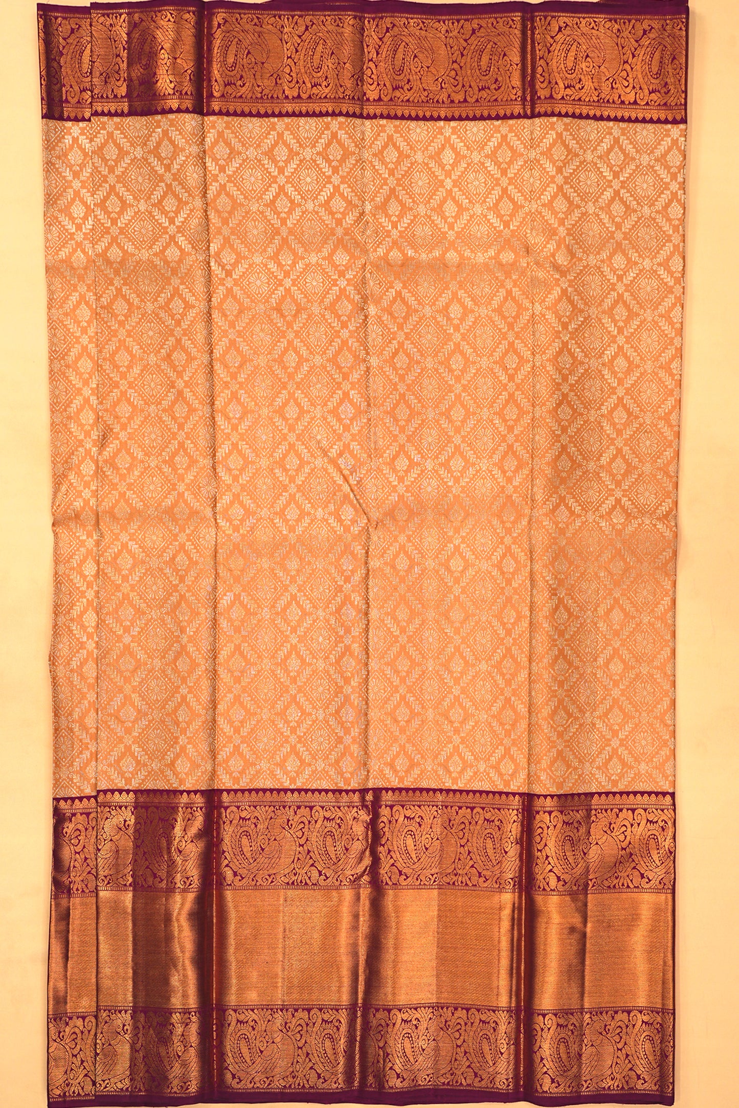 Kanchipuram Silk Jaal And Butta Pastel Orange Saree