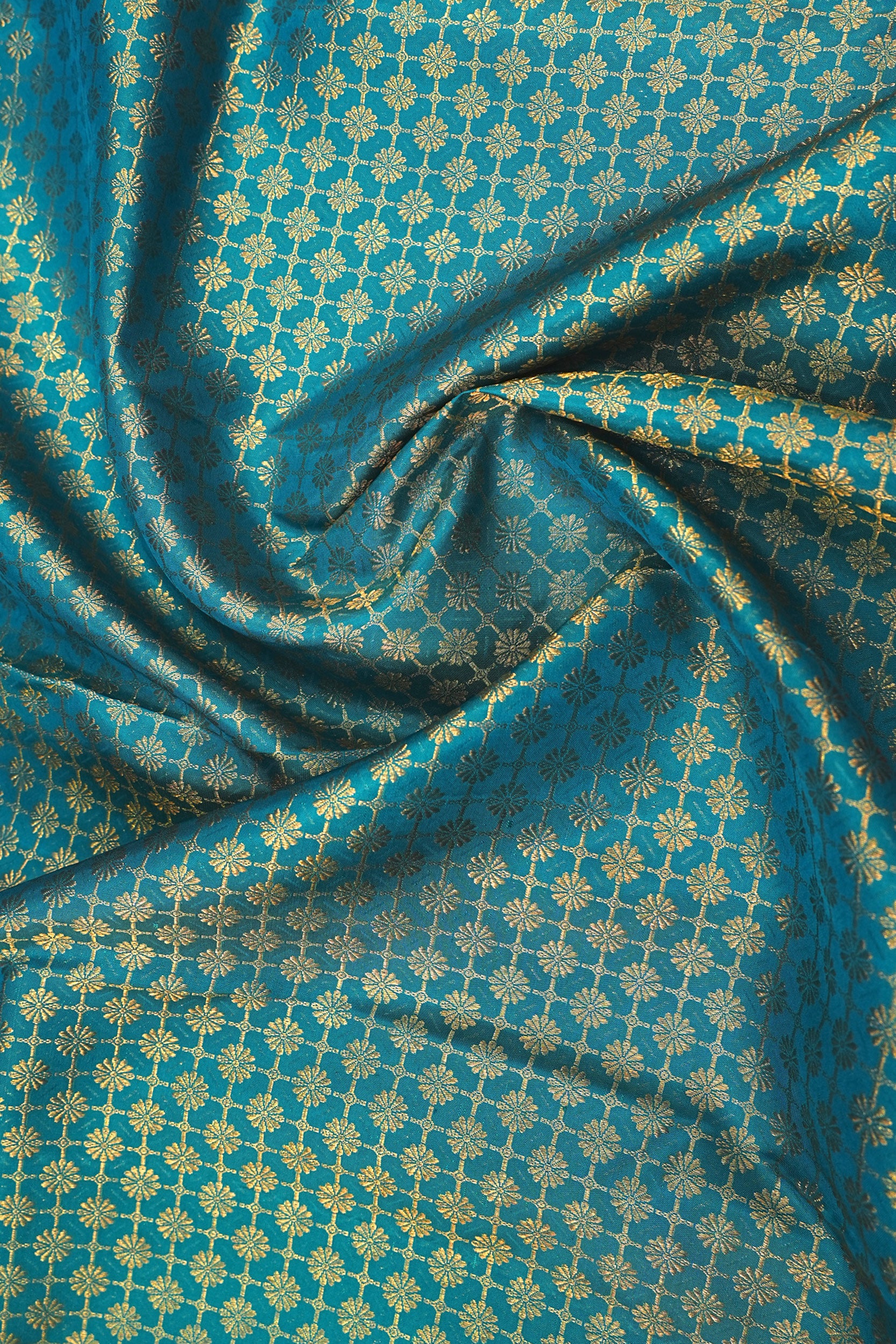 Kanchipuram Silk Checks And Butta Teal Blue Saree