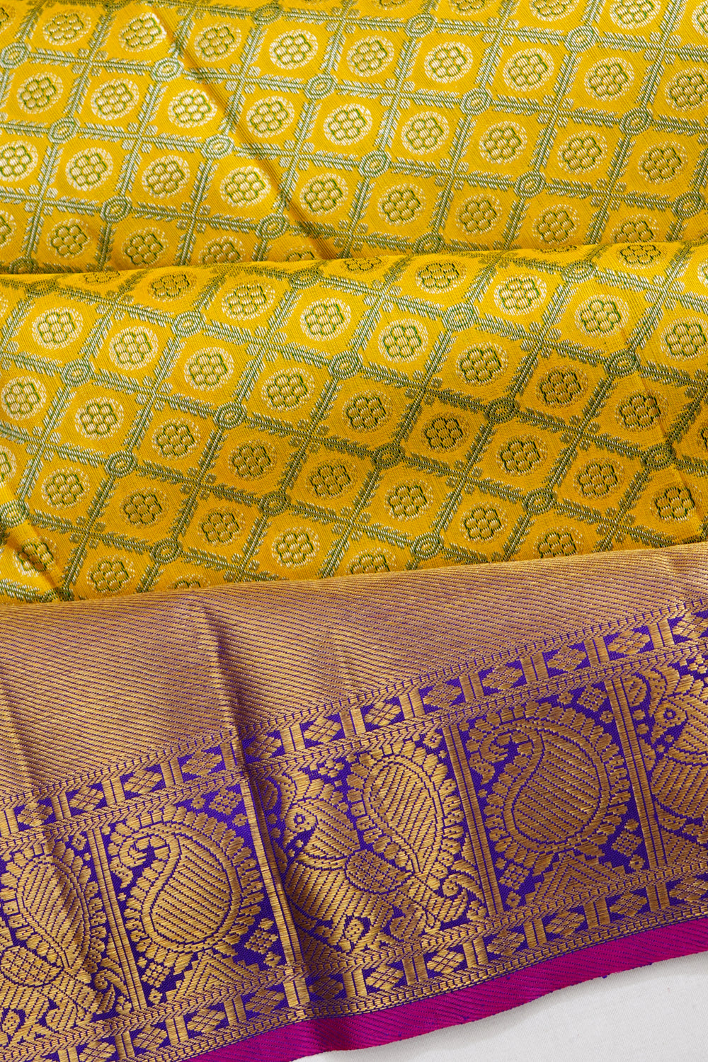 Kanchipuram Silk Criss Cross Checks And Butta Yellow Saree