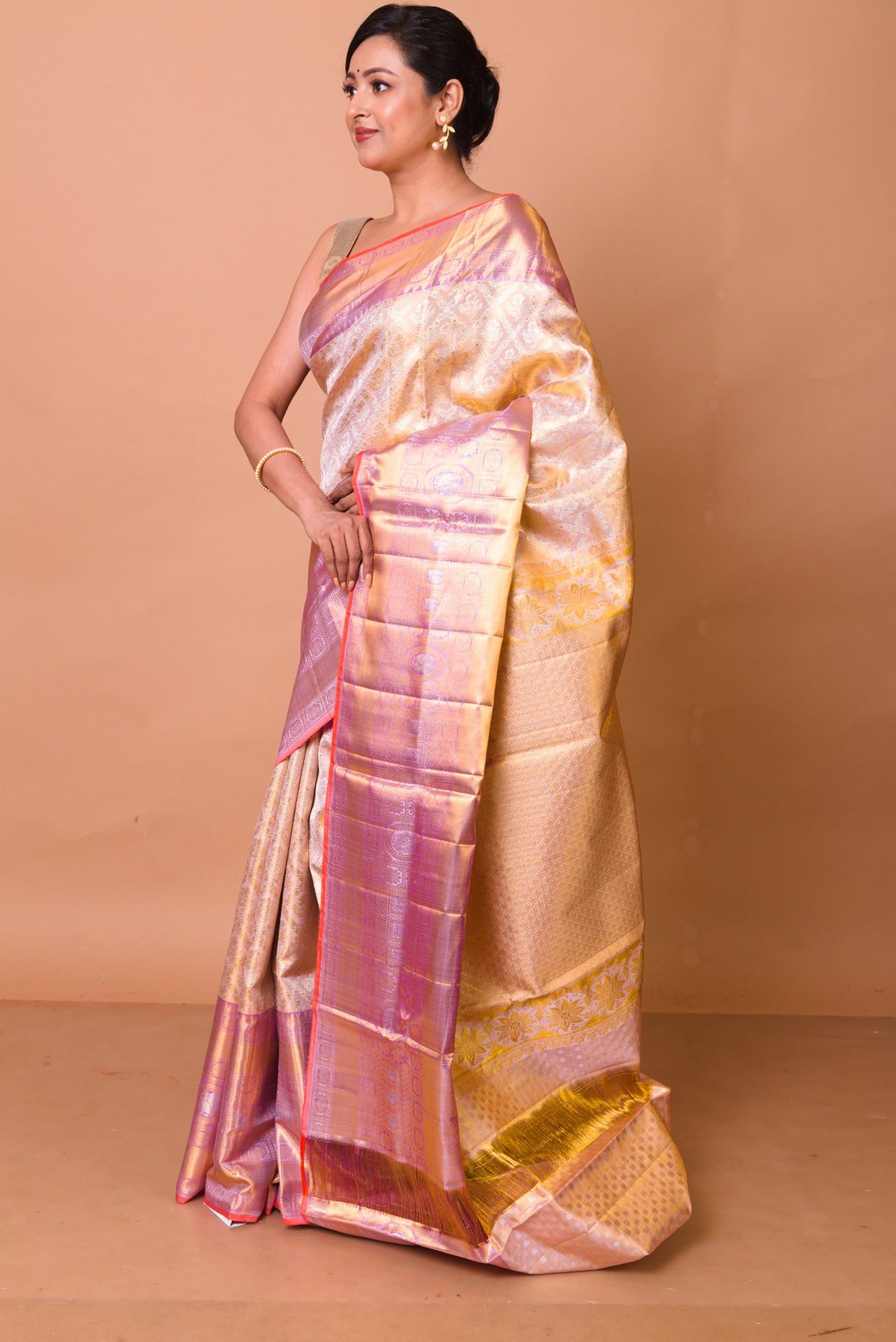 Kanchipuram Silk Tissue Criss Criss Checks And Butta Cream Saree