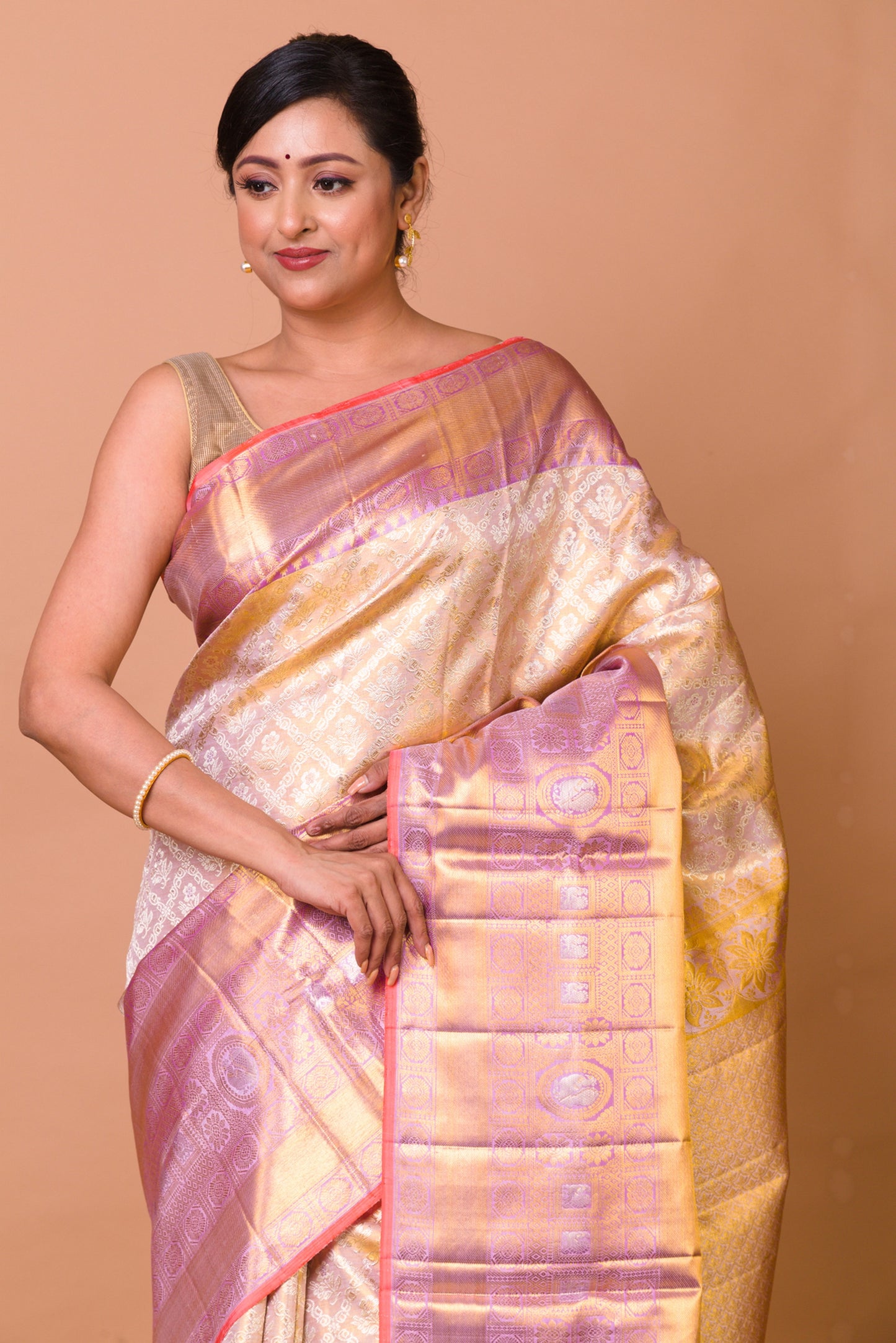 Kanchipuram Silk Tissue Criss Criss Checks And Butta Cream Saree