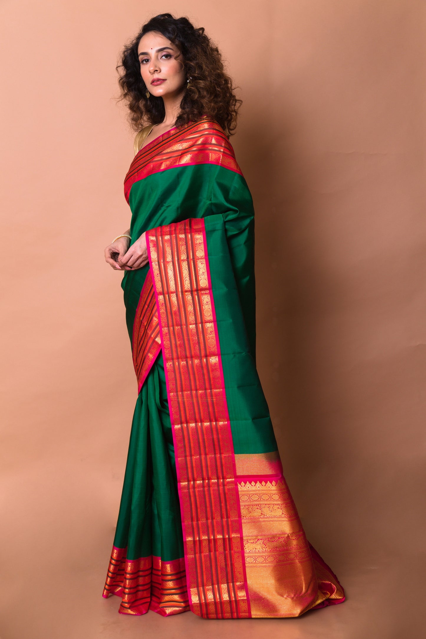 Kanchipuram Silk Plain Bottle Green Saree