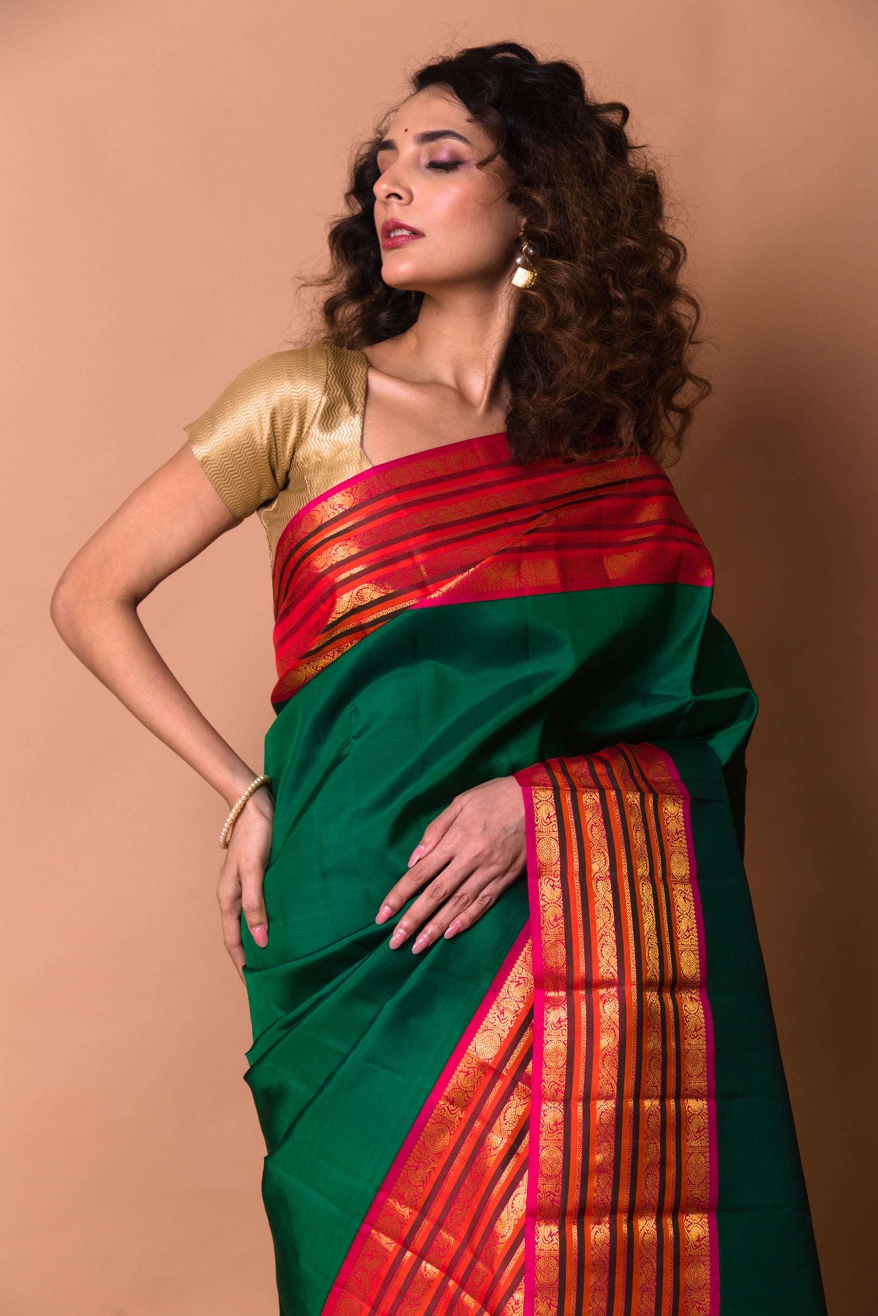 Kanchipuram Silk Plain Bottle Green Saree