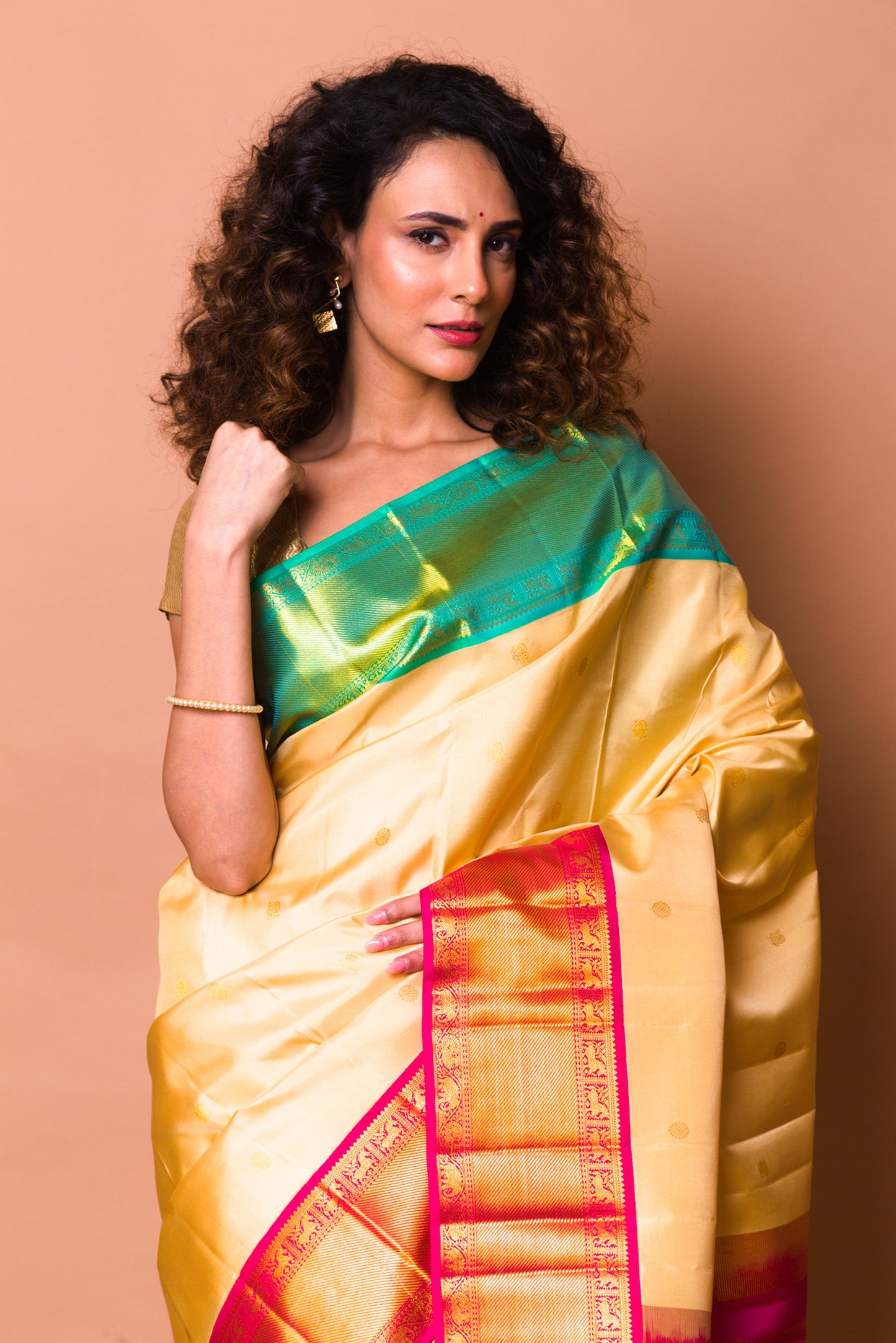 Kanchipuram Silk Butta Cream Saree With Ganga Jamuna Border
