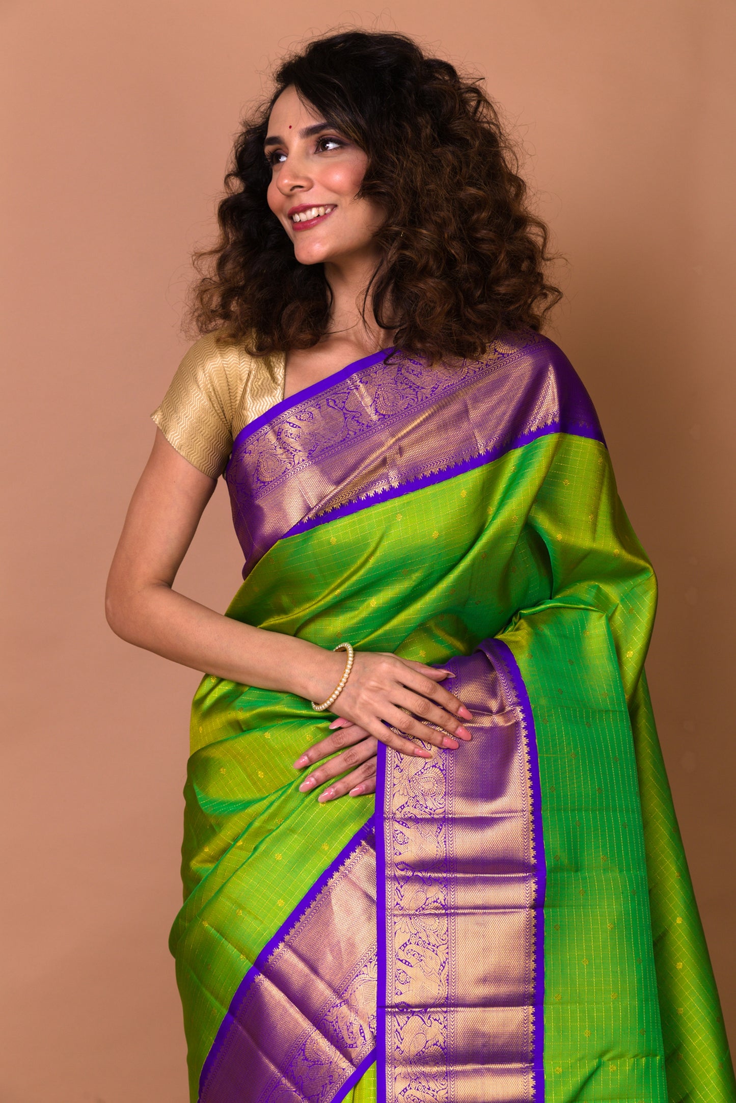Kanchipuram Silk Checks And Butta Green Saree