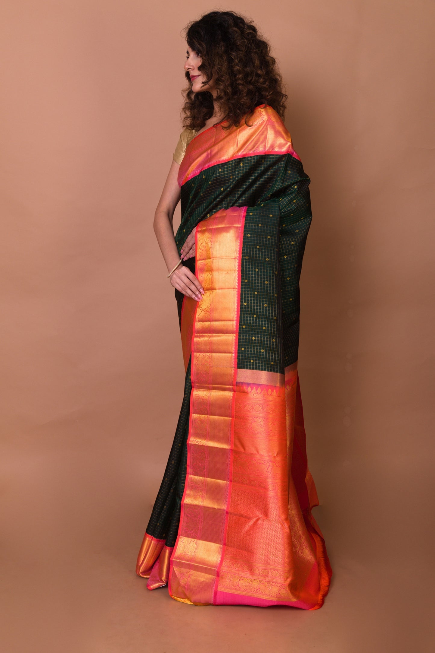 Kanchipuram Silk Checks And Butta Bottle Green Saree