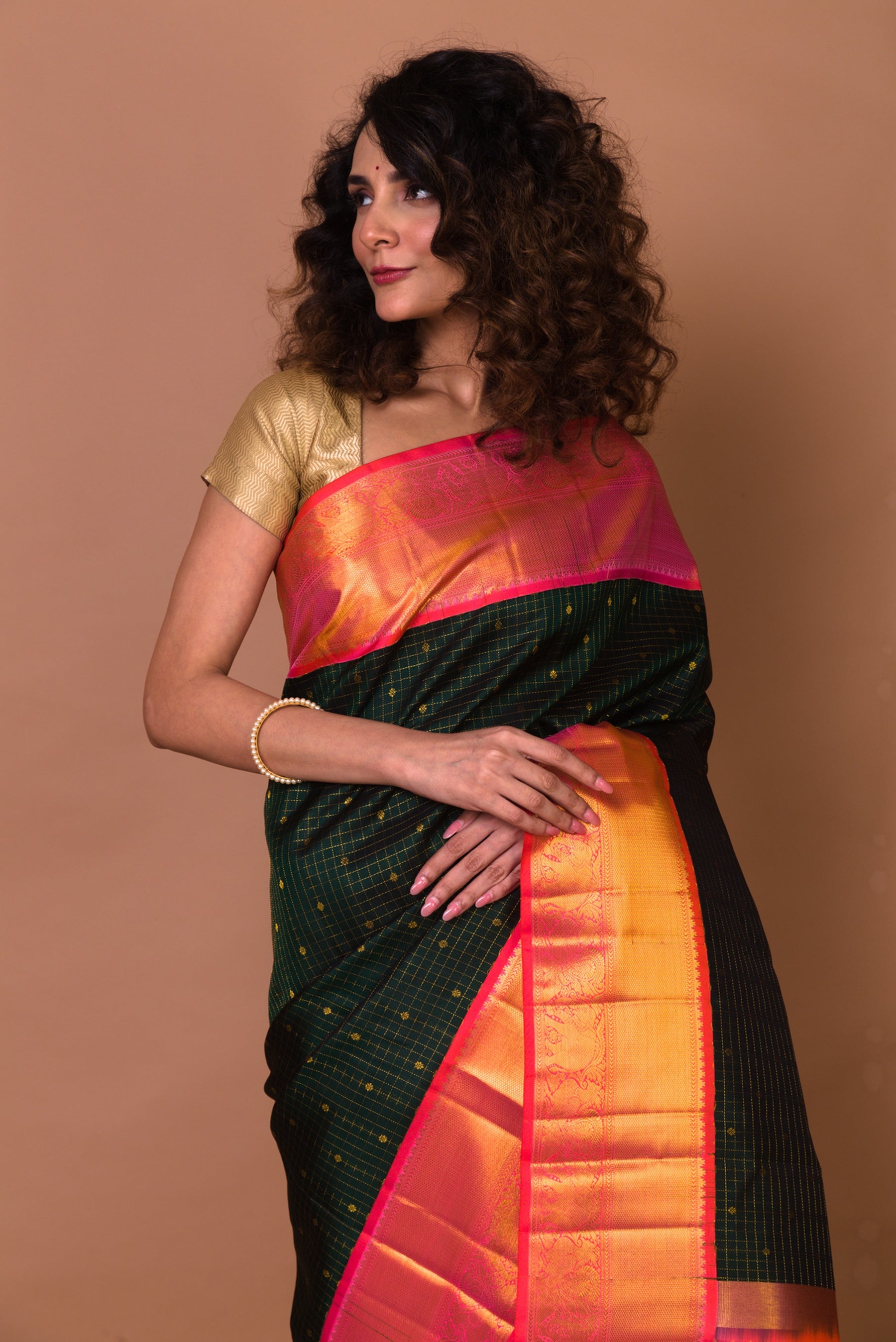 Kanchipuram Silk Checks And Butta Bottle Green Saree