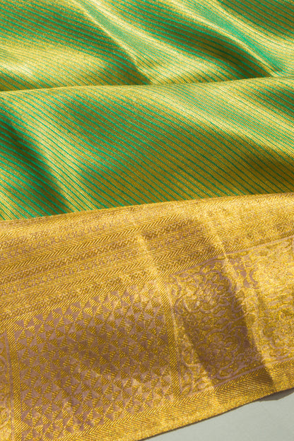 Taranga Kanchi Silk Tissue Diagonal Lines Green Saree
