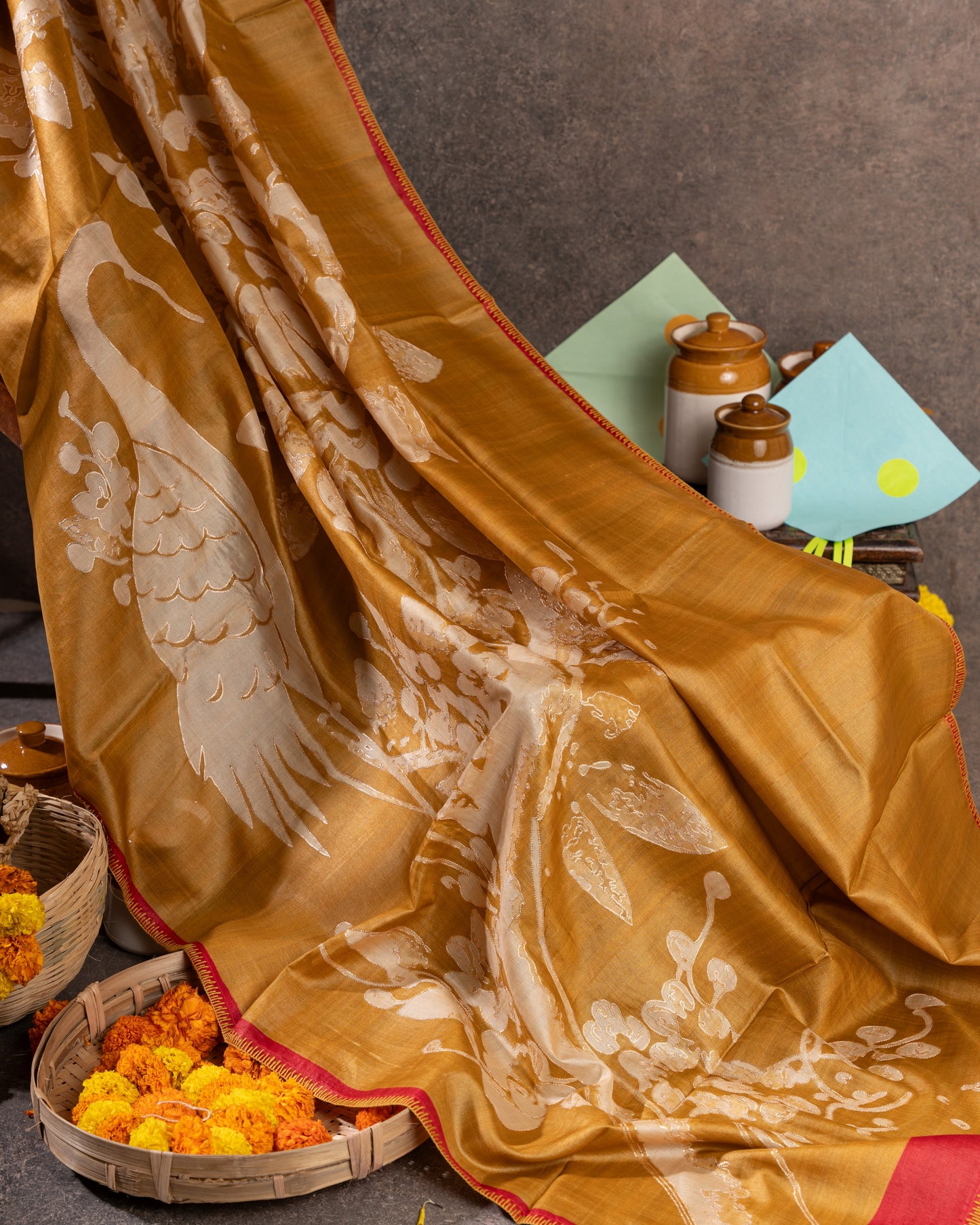 Mustard Tussar Floral Saree with Gold Zari and Red Border