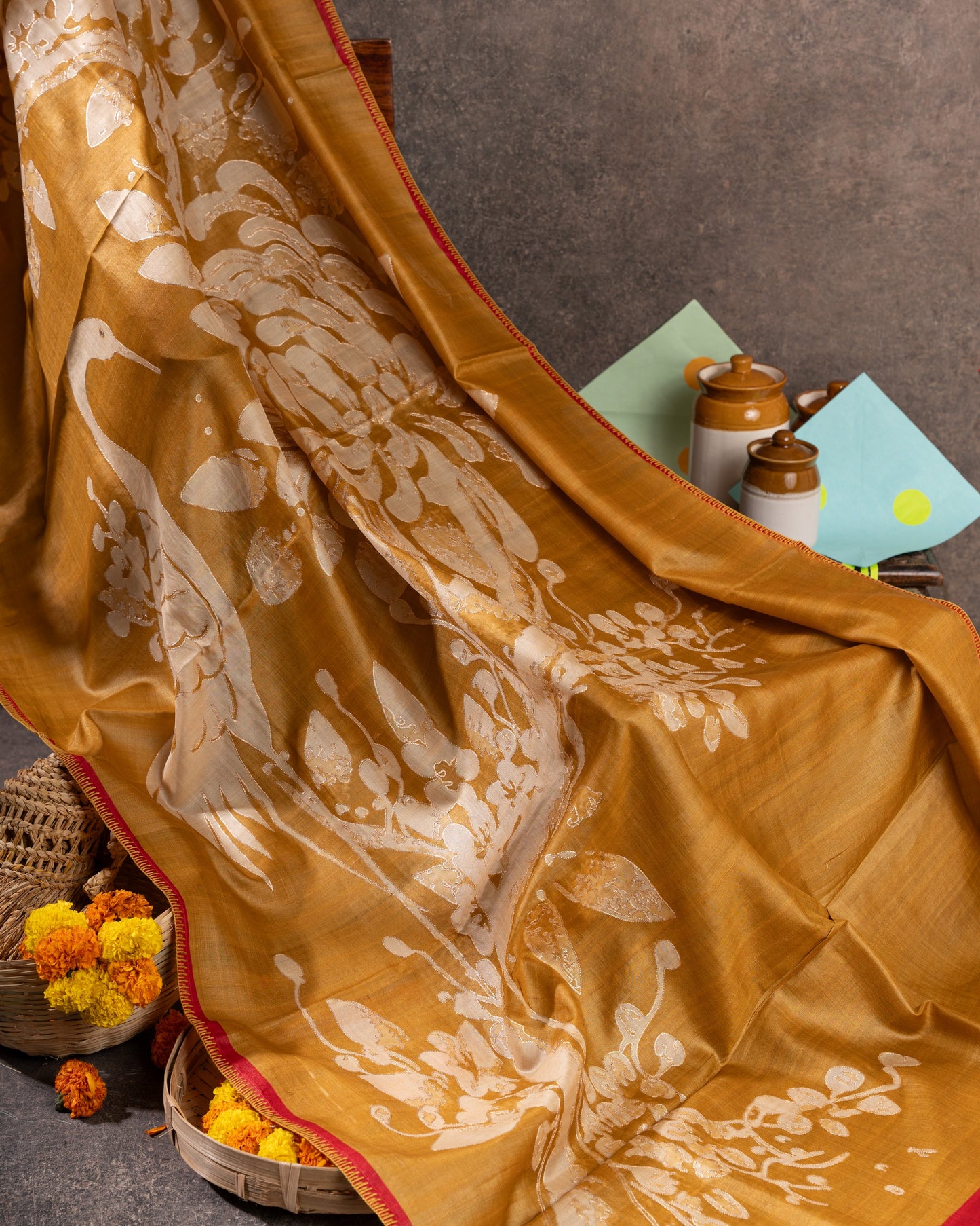Mustard Tussar Floral Saree with Gold Zari and Red Border