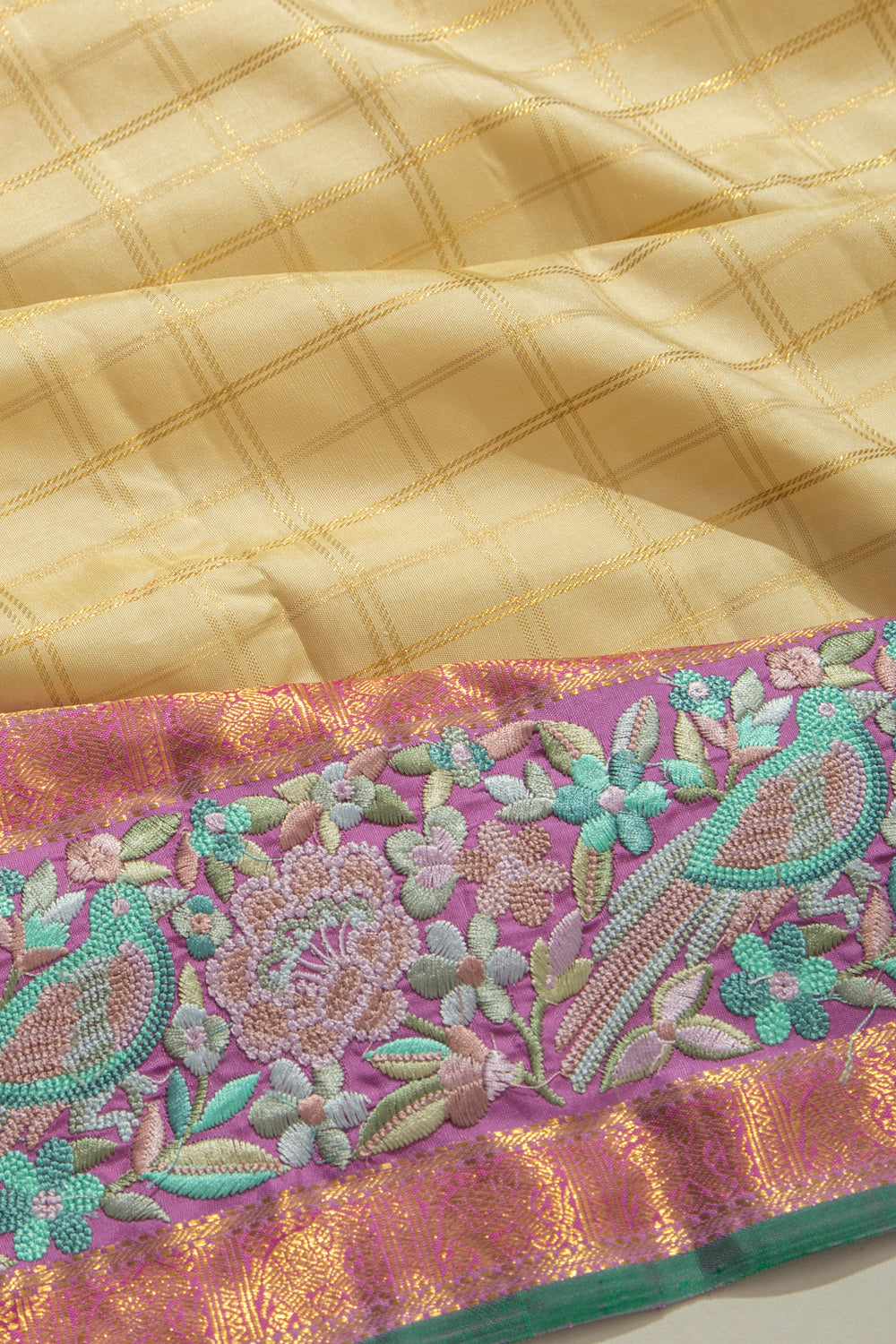 Kanchipuram Silk Checks Cream Saree With Embroidery Border