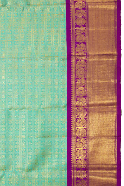 Kanchipuram Silk Checks And Butta Sea Green Saree