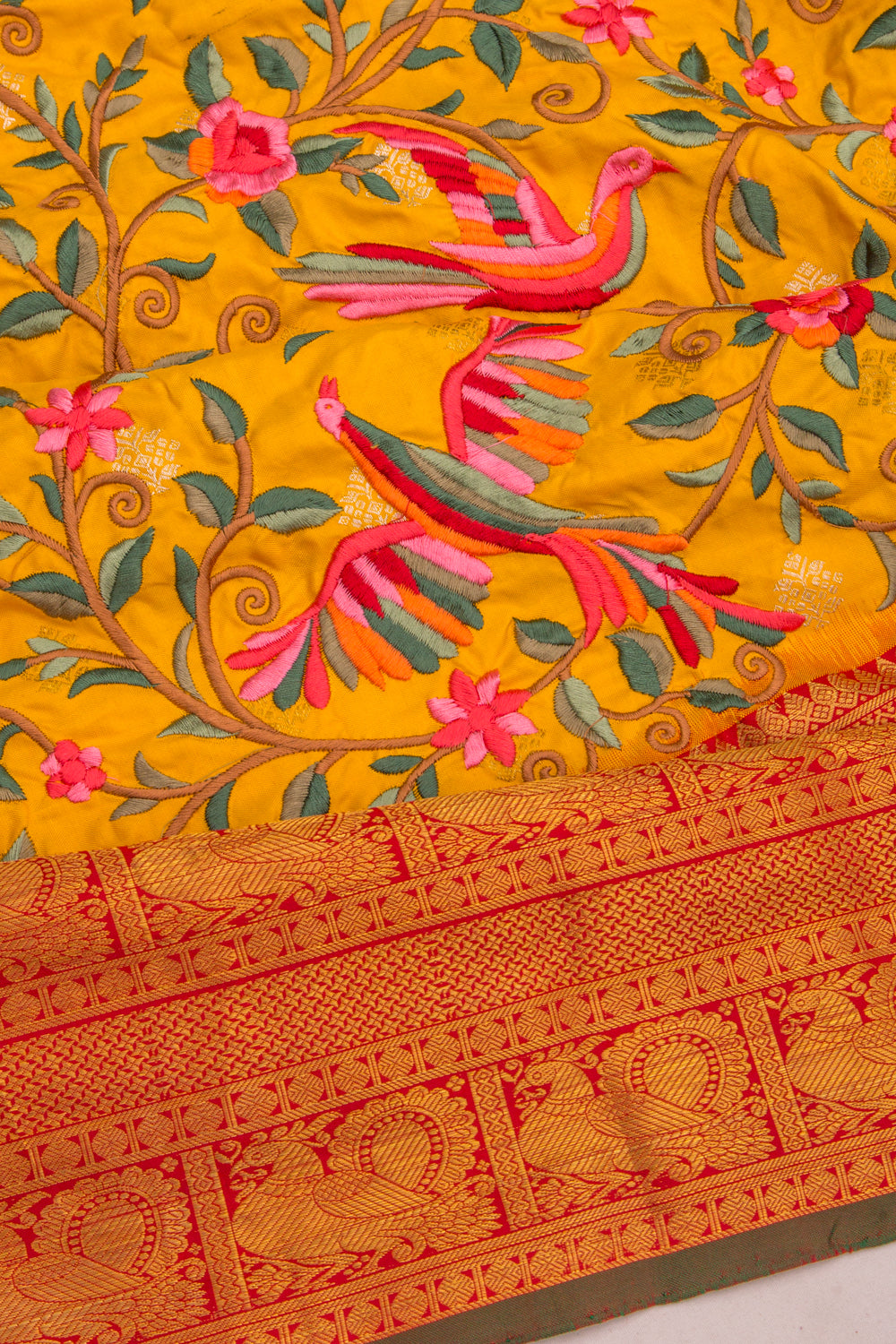 Kanchipuram Silk Floral Embroidery Yellow Saree With Ikat Blouse