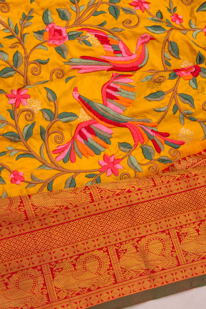 Kanchipuram Silk Floral Embroidery Yellow Saree With Ikat Blouse