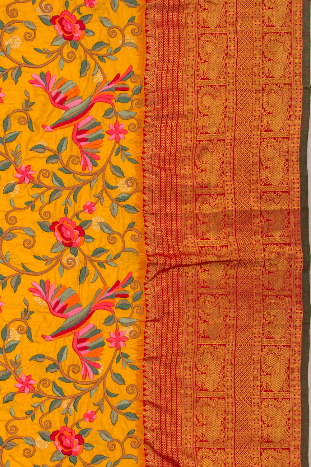Kanchipuram Silk Floral Embroidery Yellow Saree With Ikat Blouse