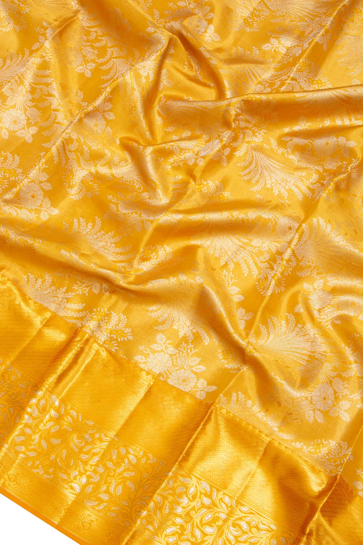 Taranga Kanchi Silk Tissue Jaal Gold Saree