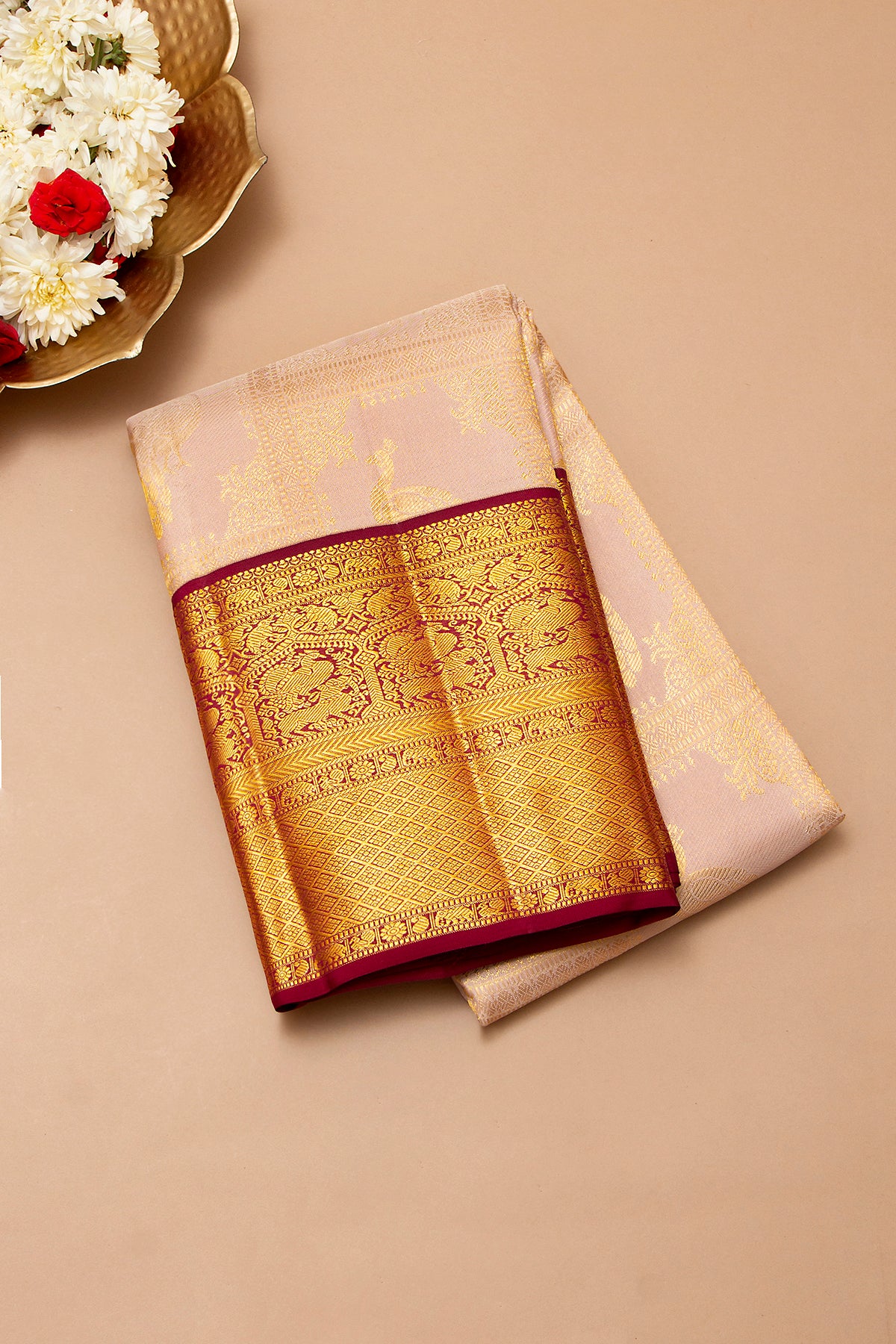Kanchipuram Silk Jaal And Butta Peach Saree