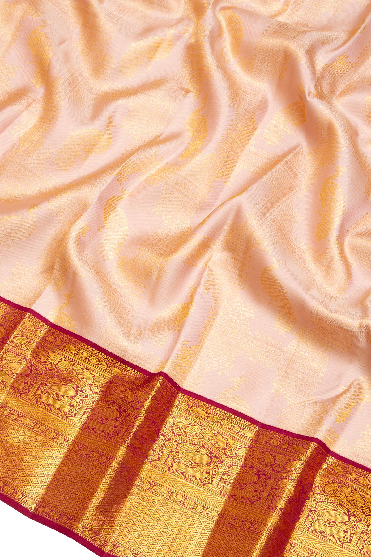 Kanchipuram Silk Jaal And Butta Peach Saree