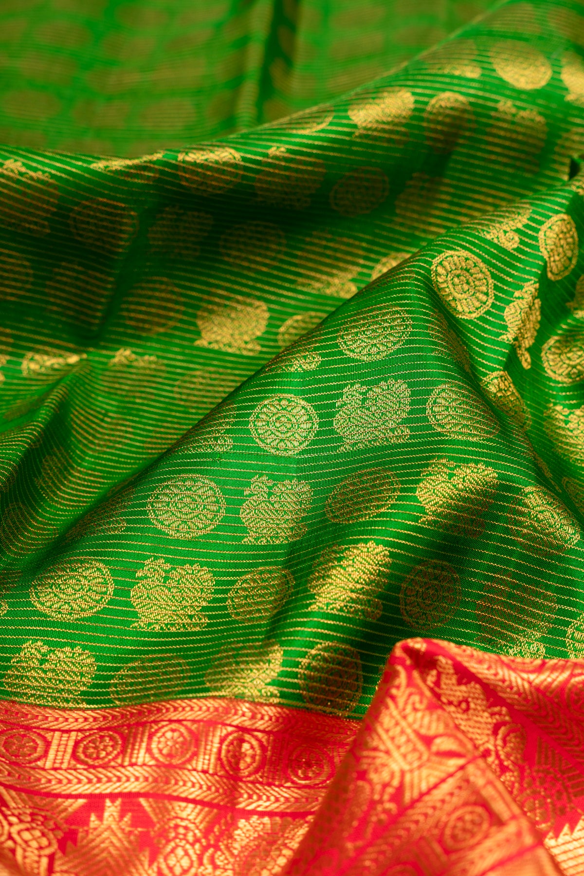 Kanchipuram Silk Oosi Lines and Butta Green Saree