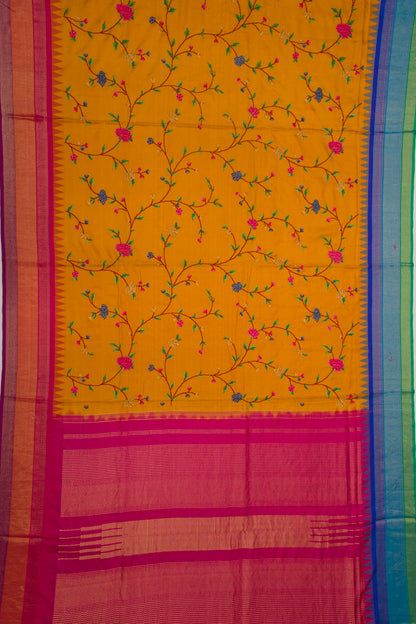 Banarasi Silk Floral Embroidery Mustard Saree With Ganga Jamuna Border