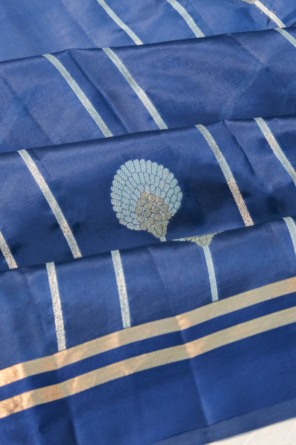 Banarasi Katan Silk Vertical Lines And Butta Blue Saree