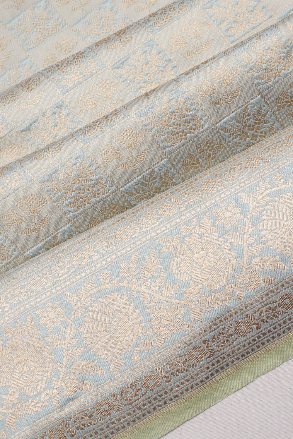 Banarasi Silk Checks And Butta Pastel Blue Saree